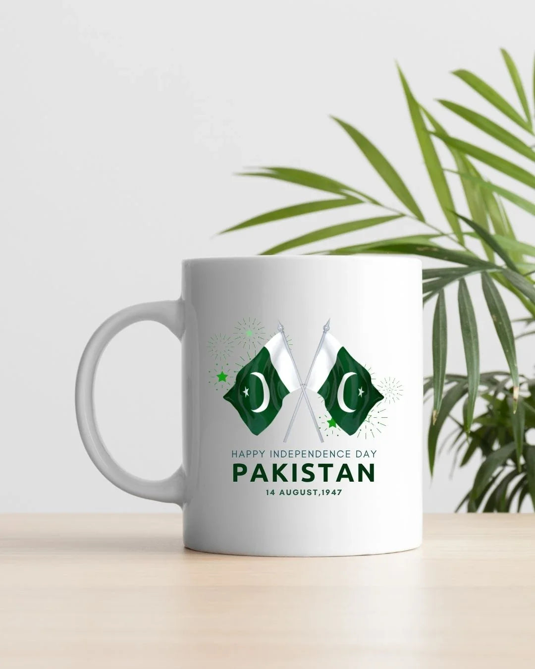 White mug with crossed Pakistan flags, fireworks accents, '14 August, 1947' — 14 August Pakistan Independence Day mug, Pak