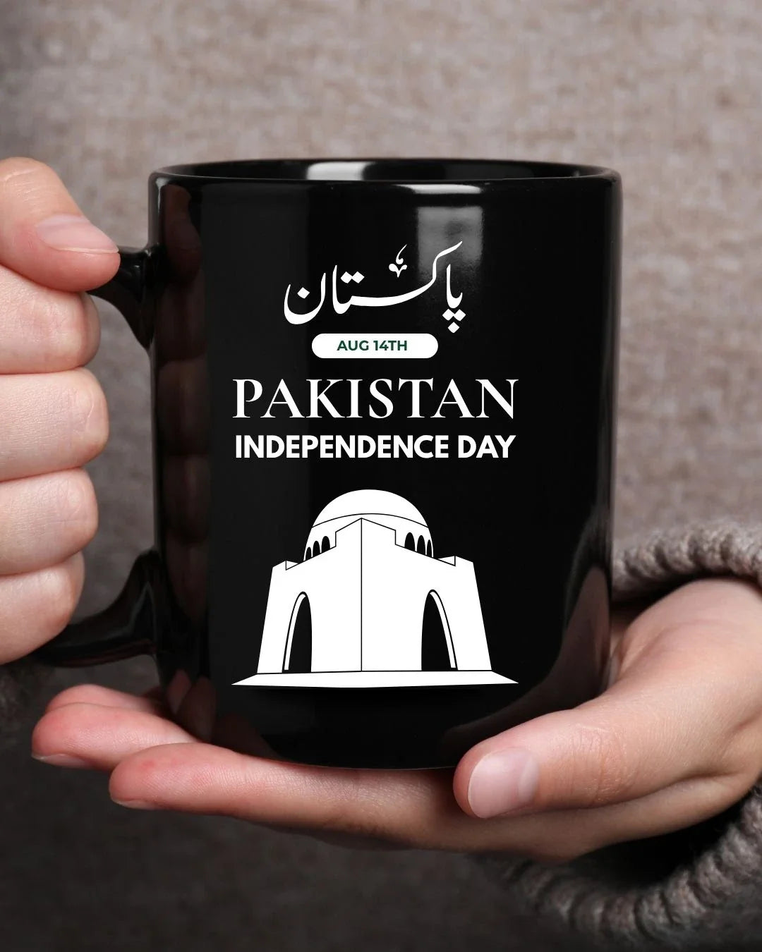 Black mug with Urdu 'Pakistan' calligraphy and white Mazar-e-Quaid illustration — 14 August Pakistan Independence Day mug