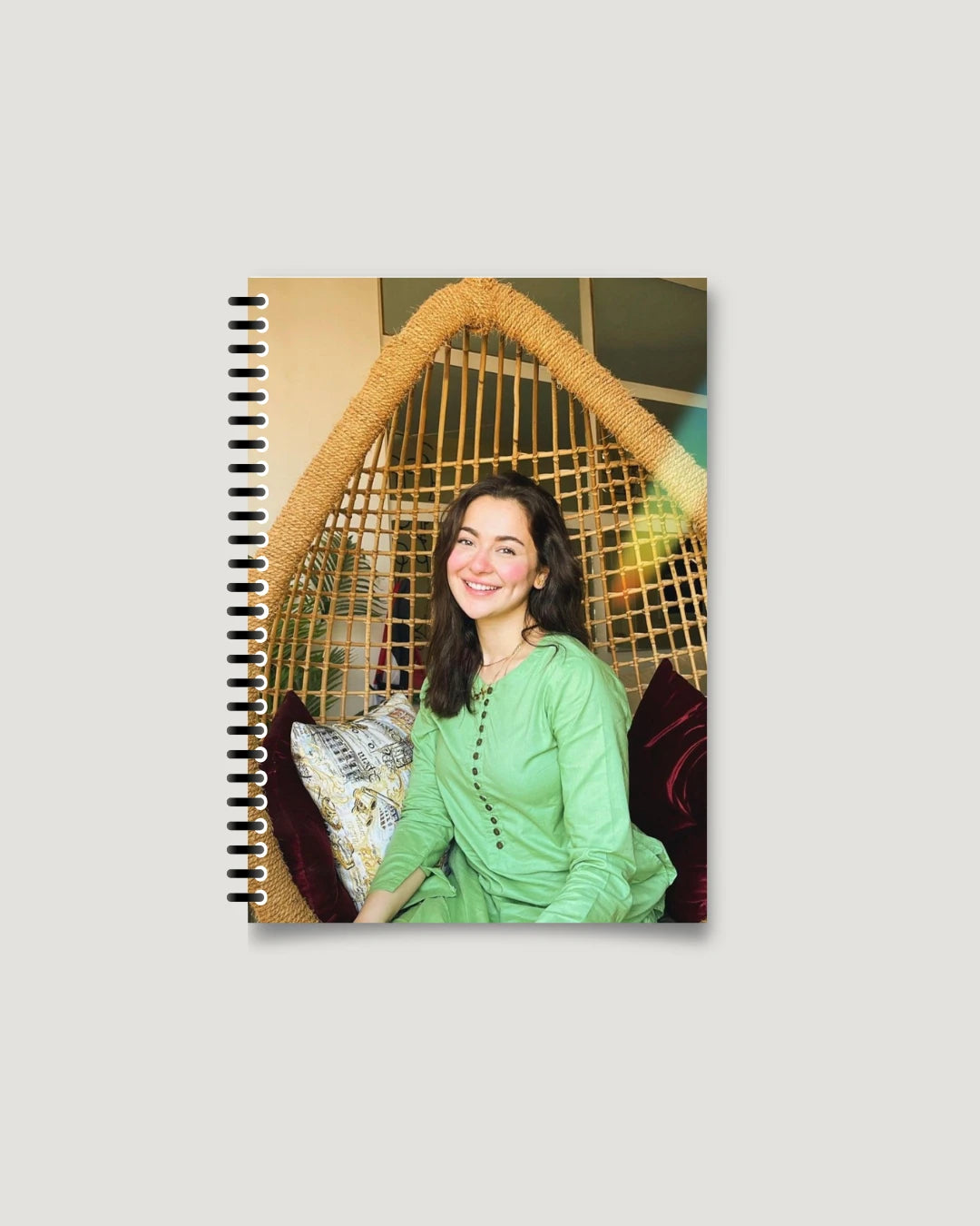 Full-bleed single portrait cover on a spiral-bound photo magazine notebook, Pakistan