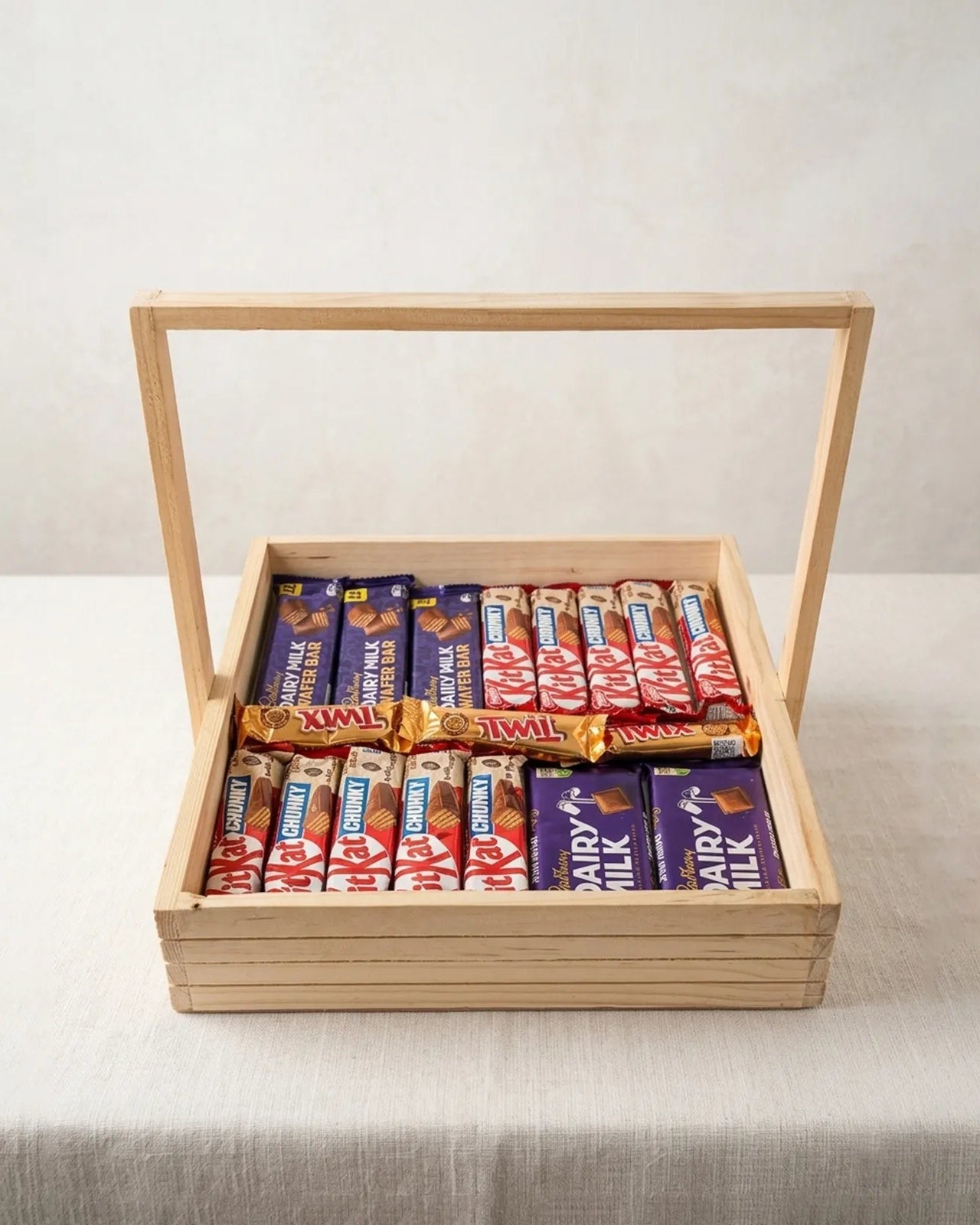 Wooden 12x12 premium chocolate mix gift tray with KitKat Crunchy, Cadbury Dairy Milk, Twix and Dairy Milk Wafer Bars by The Love Language Pakistan