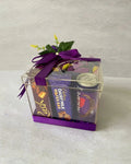 Purple chocolate hangout gift box with Dairy Milk Wafer Bar and Rush chocolate in clear acrylic box by The Love Language Pakistan
